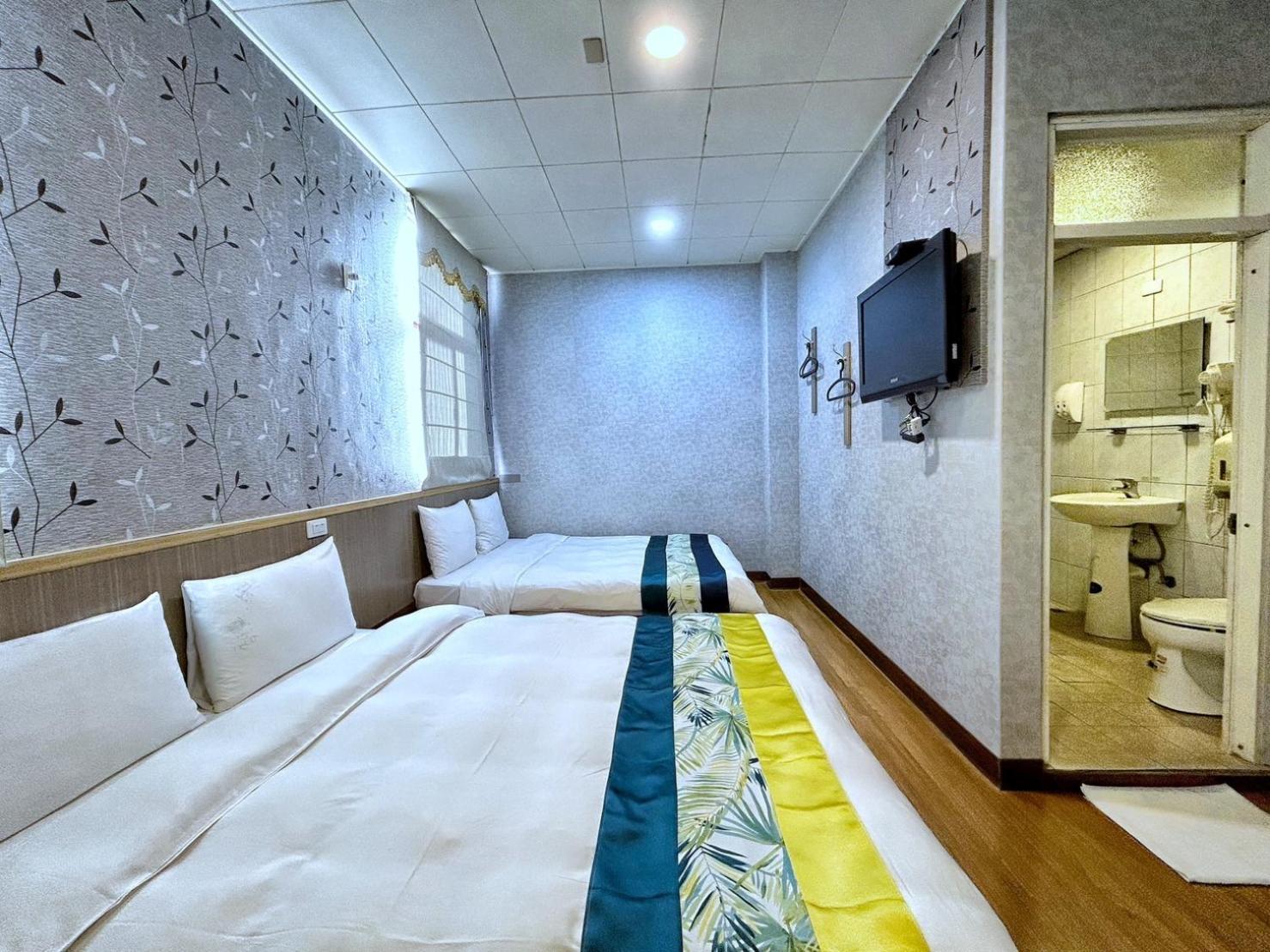 Fulong Hotel Zhongli Bagian luar foto